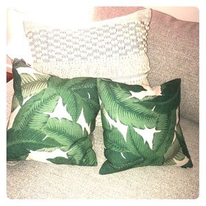 Matching palm leaf down feathered throw pillows